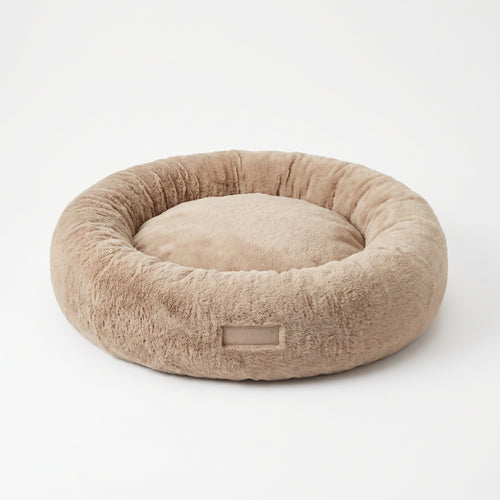 Ortopædisk beroligende donut-hundeseng i beige